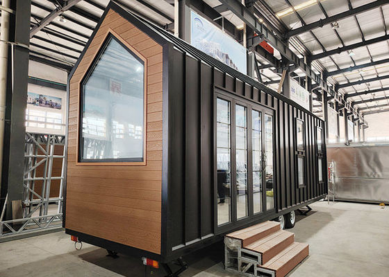 US/AS Casa prefabbricata Casa modulare Casa piccola su roulotte con telaio in acciaio leggero